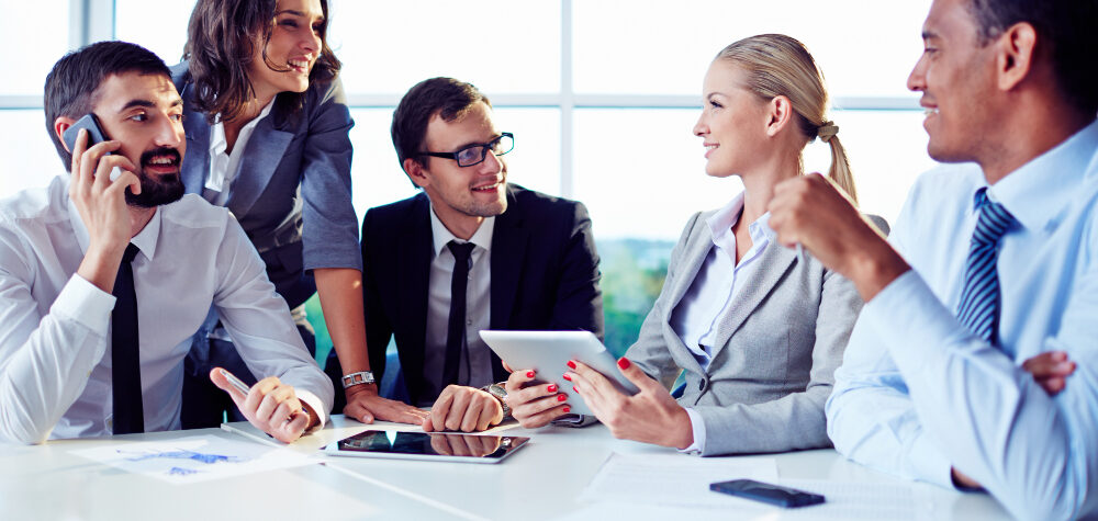 co-workers-planning-work-with-digital-tablet